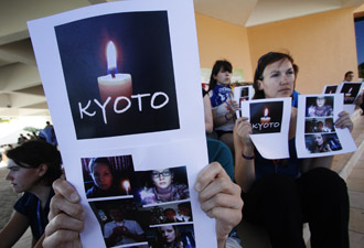 Canadians demonstrate outside the climate change talks in Cancun, Mexico, on Friday. 