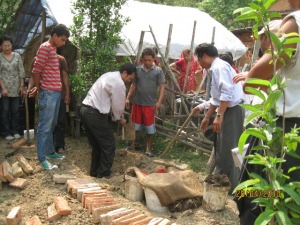 Digging a hole for the cow pat pit